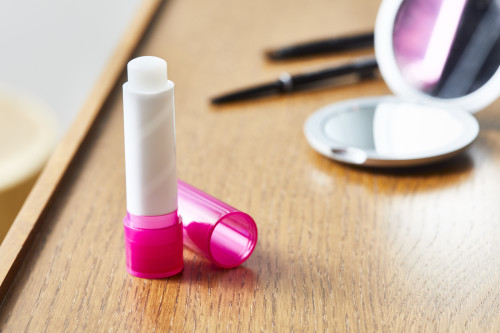ABS kunststof lippenbalsem stick met SPF15 bescherming roze ambiance